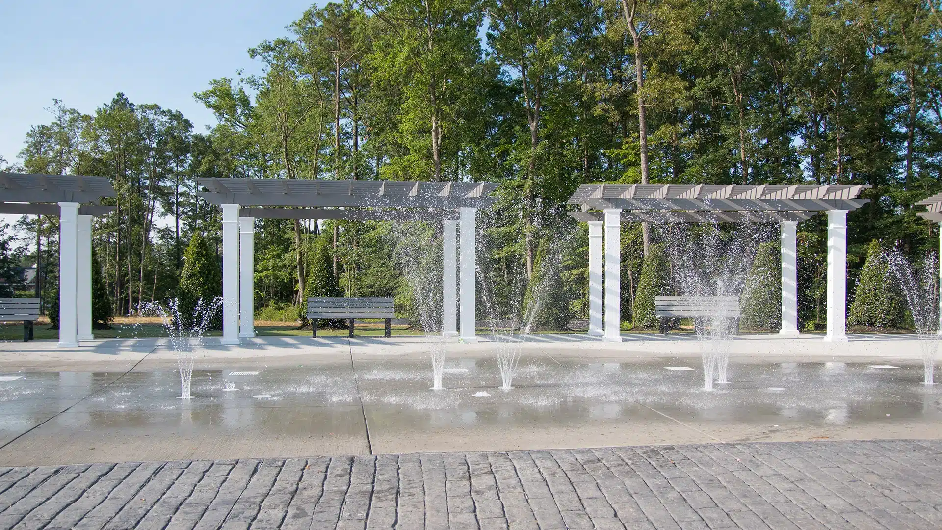 Fiberglass pergolas in a park setting