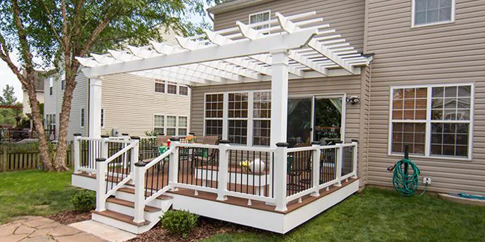 Attached Trex Pergola with motorized shade canopy