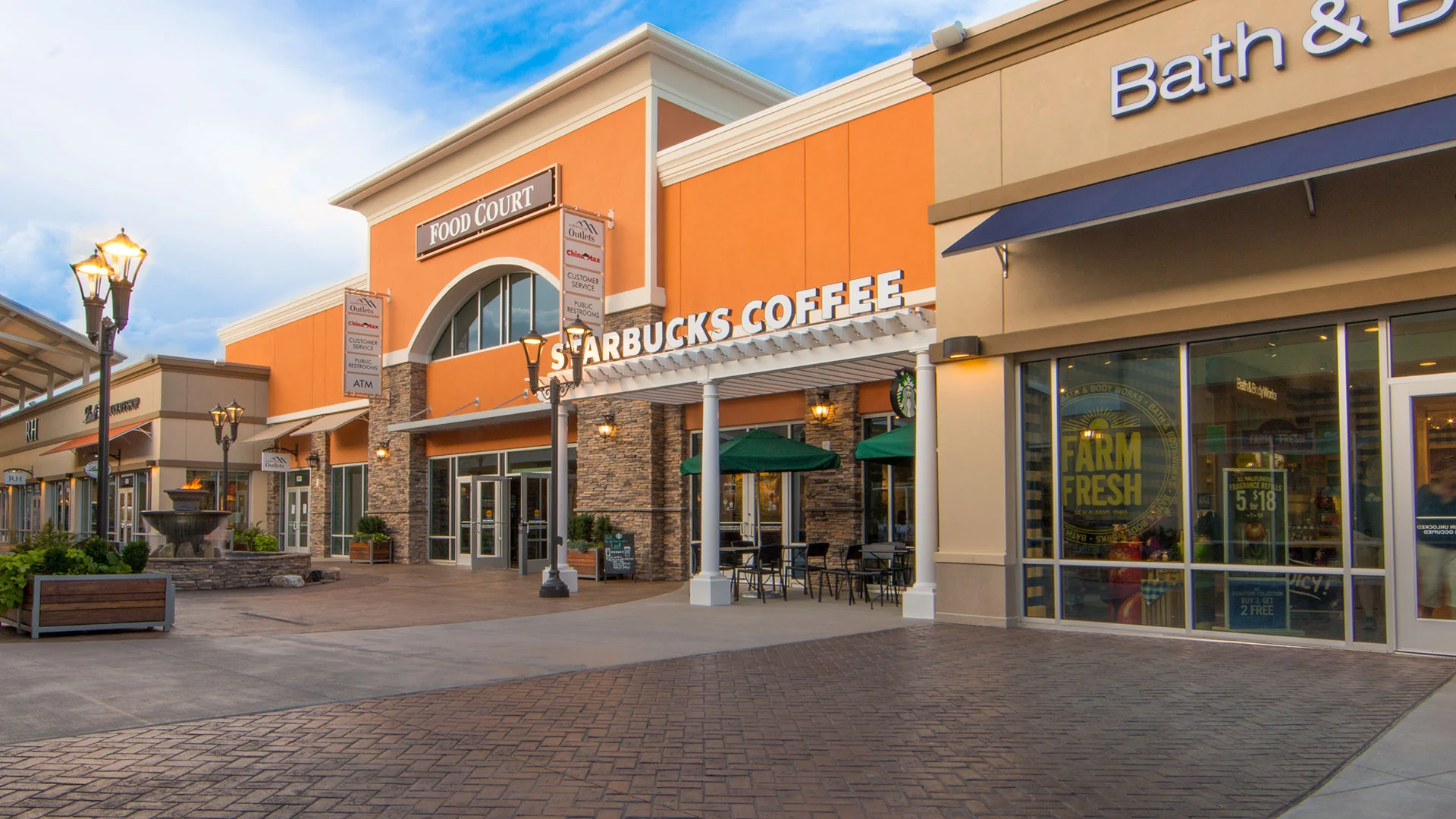 Attached white vinyl pergola at Asheville Outlet Mall