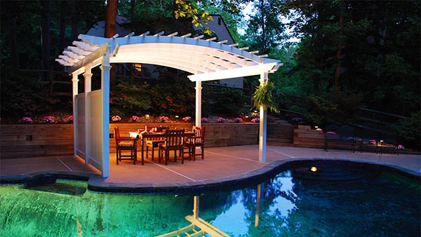 White vinyl pergola near pool