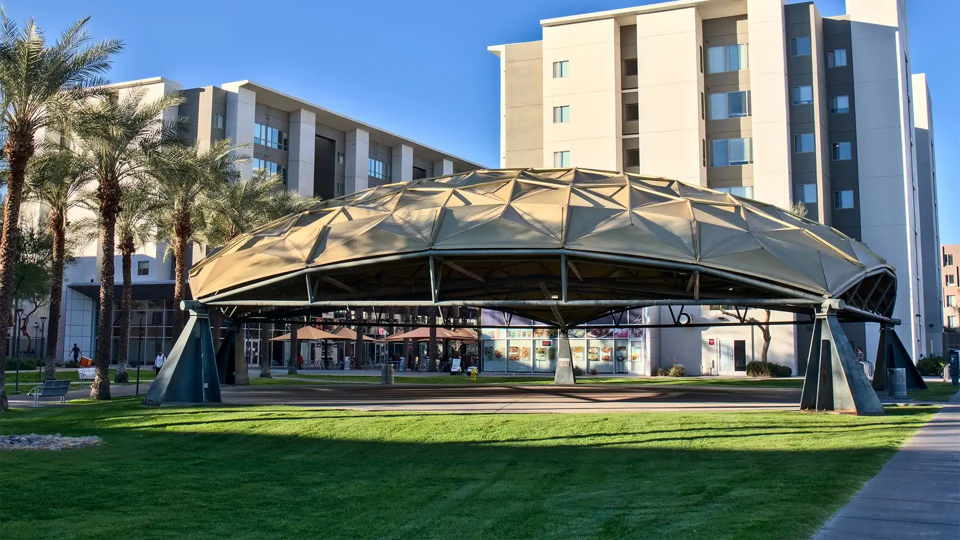 Featured image for “The Importance of Built Shade”As temperatures rise, built shade is becoming essential infrastructure. Learn how thoughtfully designed pergolas, canopies, and architectural shade structures protect public health, lower temperatures, and create outdoor spaces people actually use.16727:full